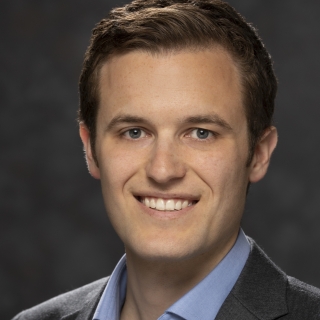 a formal portait of Christopher Heidelberger