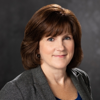 A portrait photo of Julie Caswell.