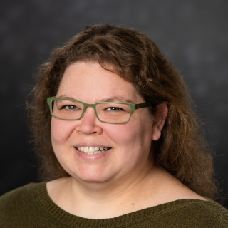 A portrait photograph of Stephanie Fried.