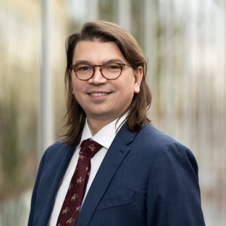 A portrait photograph of Matthew McLaughlin.