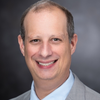 Portrait image of Jonathan E. Gans