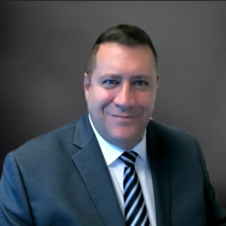 Formal portrait of Scott Mancini. 